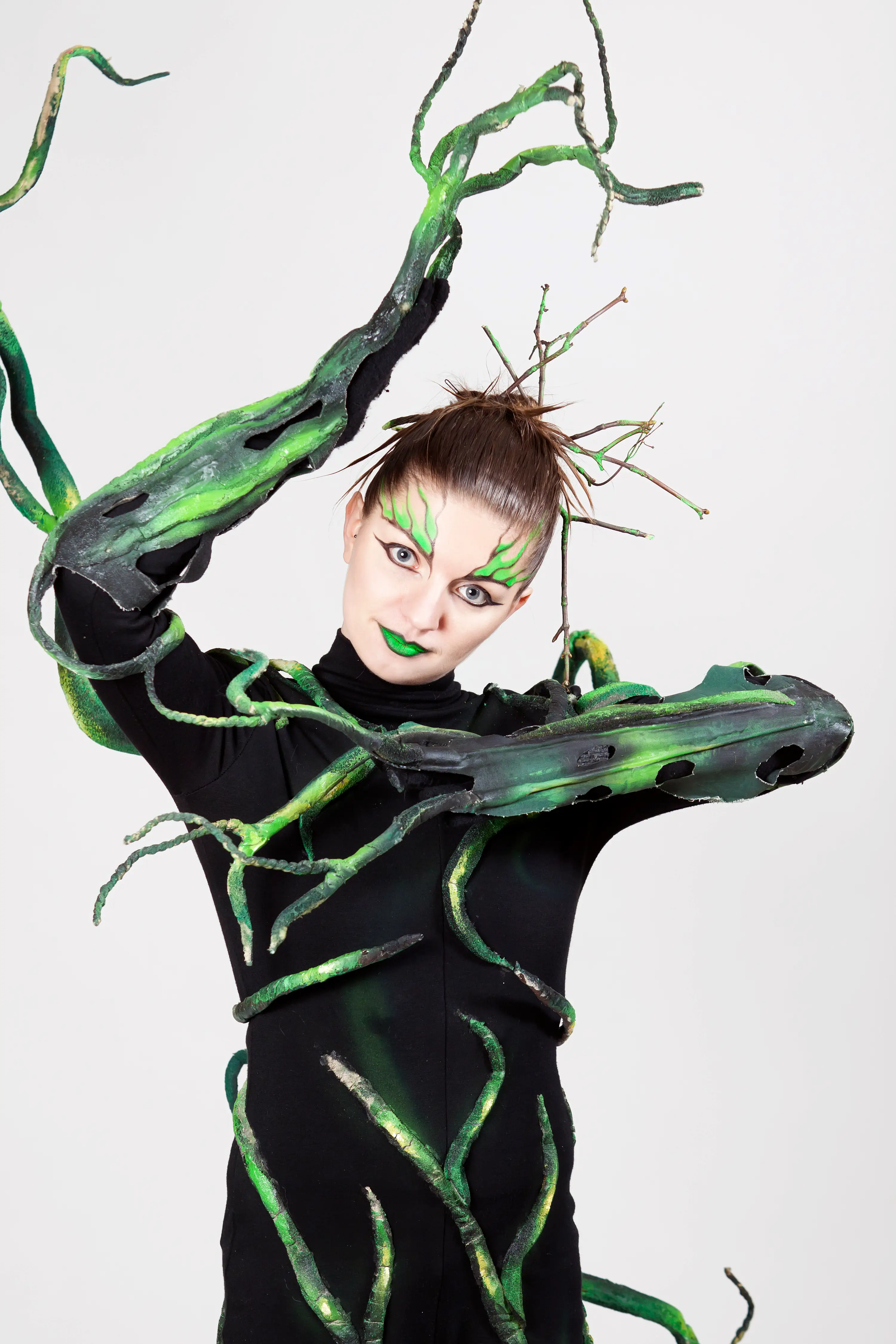 Woman transformed into a fantasy tree-like being – featuring bark textures, green makeup, and twig crown. -w Lubinie, w Brzegu, w Oławie, we Wrocławiu, w Opolu, w Legnicy - optimized version for fast loading