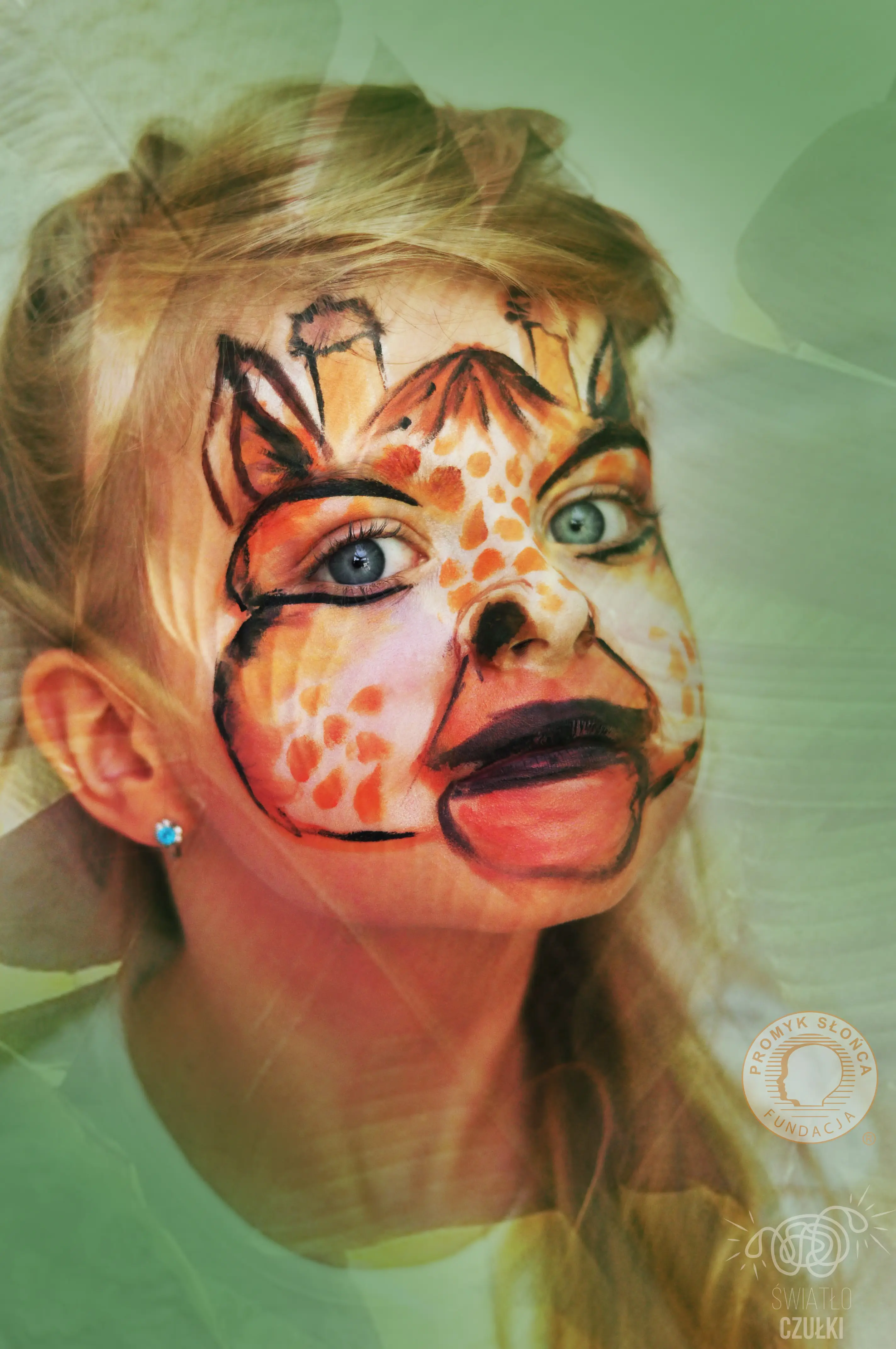 Child with face painted in giraffe patterns, smiling with bright eyes. -w Lubinie, w Brzegu, w Oławie, we Wrocławiu, w Opolu, w Legnicy - optimized version for fast loading