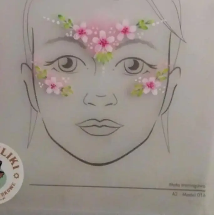 Artistic face painting – pastel cherry and apple blossoms with green leaves forming crown on child's forehead. -w Lubinie, w Brzegu, w Oławie, we Wrocławiu, w Opolu, w Legnicy - optimized version for fast loading