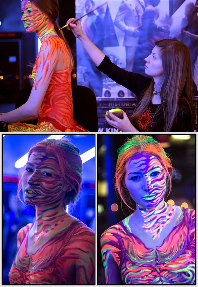 Modelka z fluorescencyjnym malowaniem ciała w kształcie płomieni feniksa, świecącym w świetle UV. - bezpieczne, hipoalergiczne farby do twarzy i ciała, zmywalne - Legnica, Opole, Oława, Lubin, Wrocław, Brzeg - zoptymalizowana wersja do szybkiego ładowania
